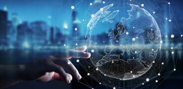 Hand touching digital world