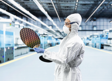 Semiconductor lasers image man holding Medium